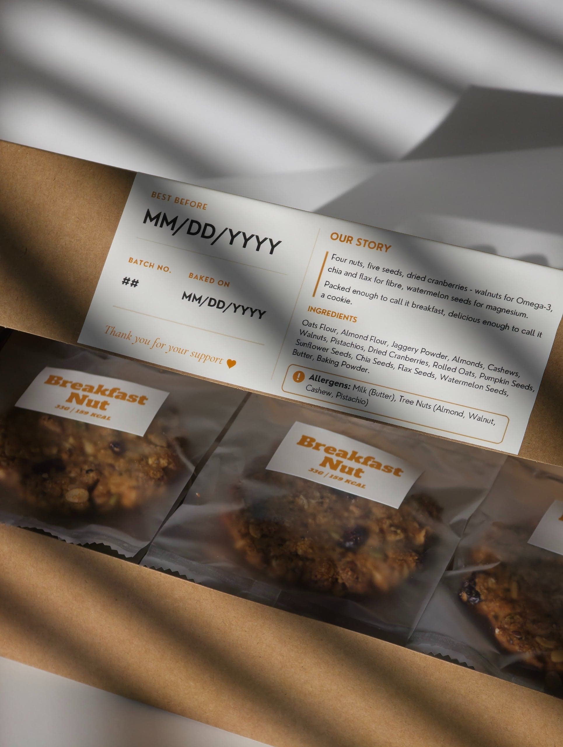 A box of cookies packed by hand, labelled and ready to collect