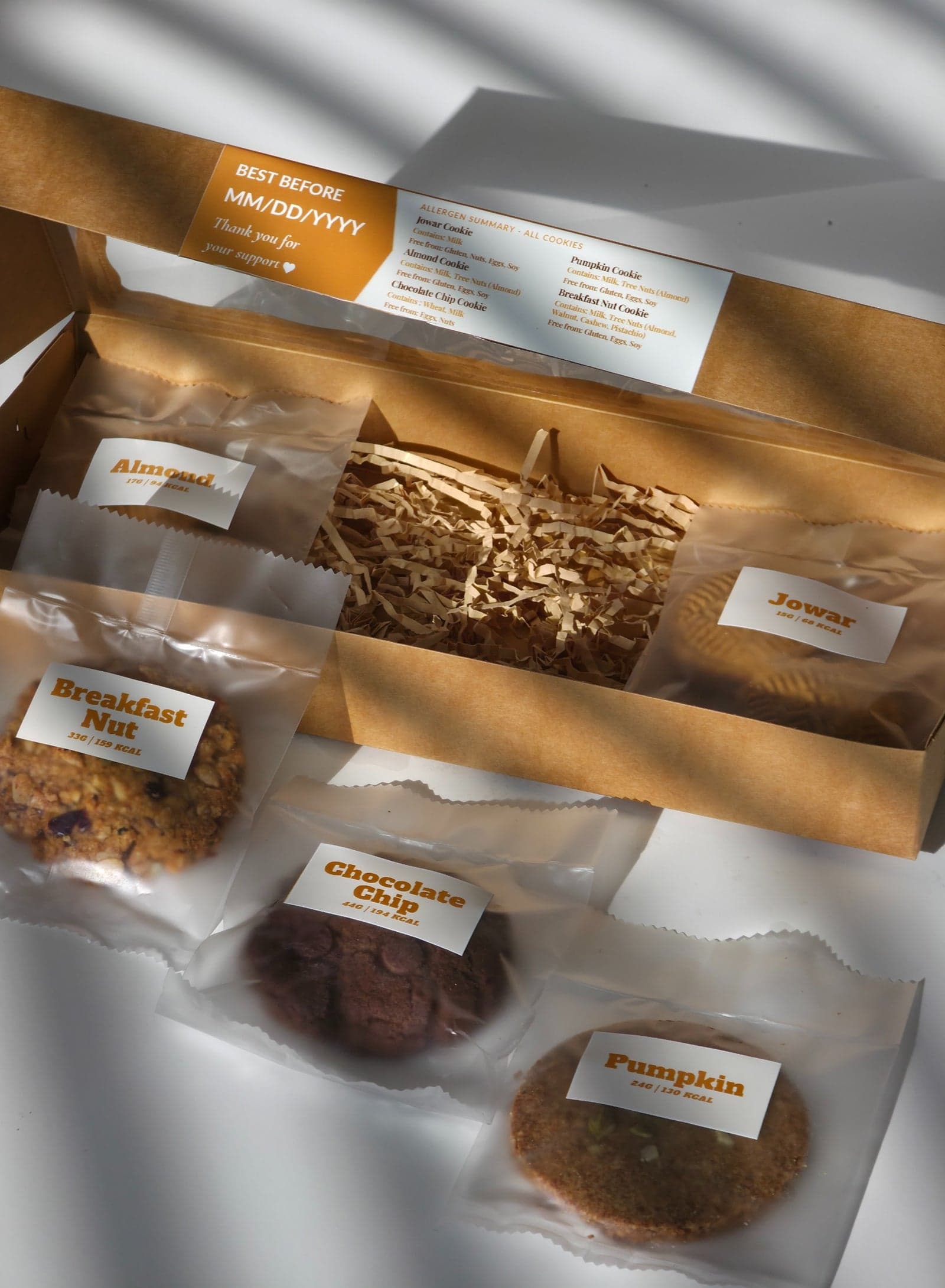 Sampler gift box with almond, jowar, breakfast nut, chocolate chip and pumpkin cookies